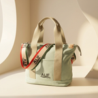pistachio all day carry all handbag with beige straps and 'ALIF' branding on a neutral background